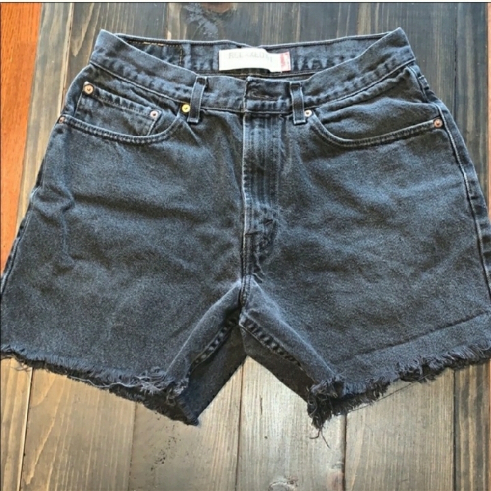 Black distress Levis cutoffs. Super cute!!
